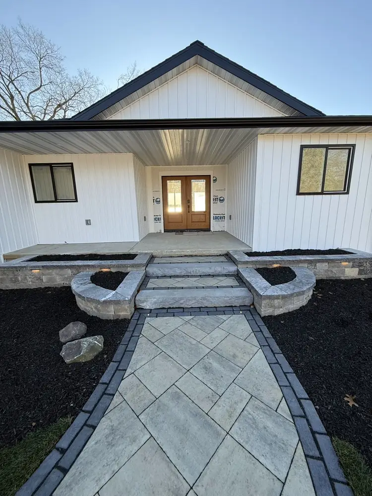 Lakeside patio layout and perimeter retaining wall installation view 1