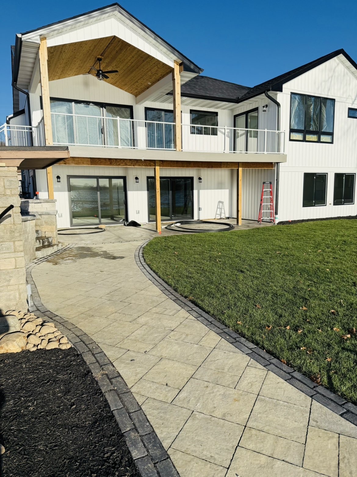 Lakeside patio layout and perimeter retaining wall installation view 3