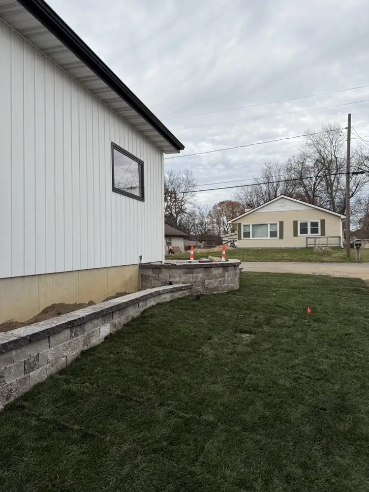 Lakeside patio layout and perimeter retaining wall installation view 5