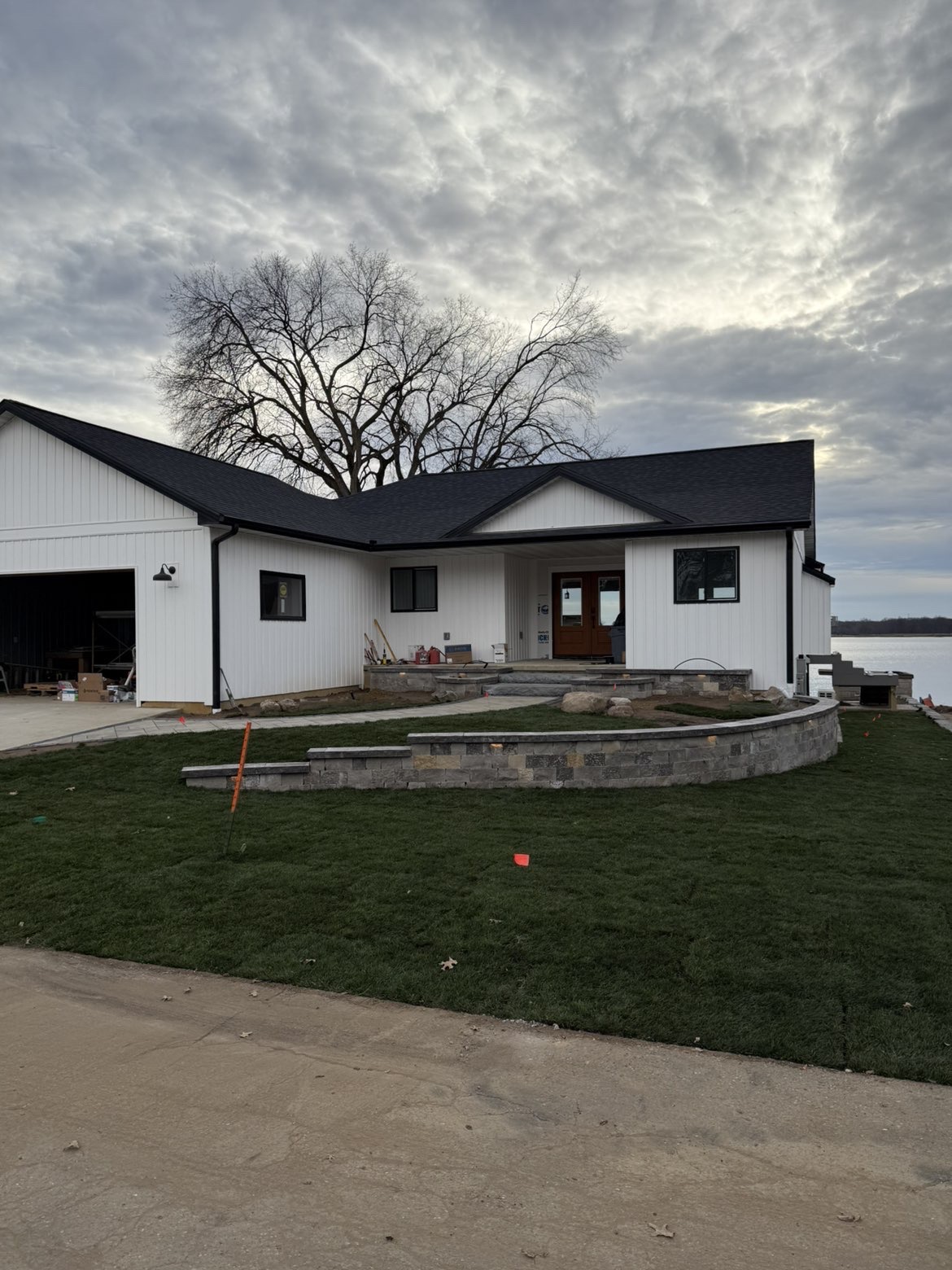 Lakeside patio layout and perimeter retaining wall installation view 7