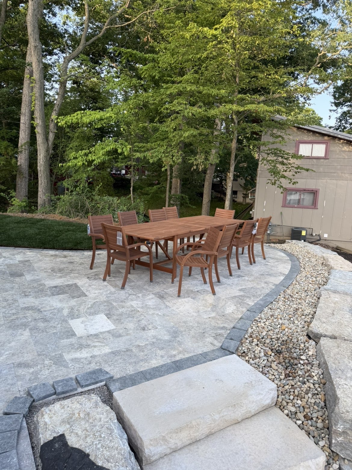 Integrated drainage and retaining wall backfill system