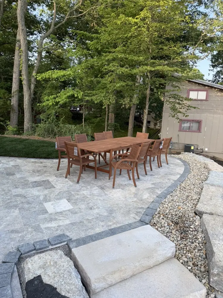 Integrated drainage and retaining wall backfill system