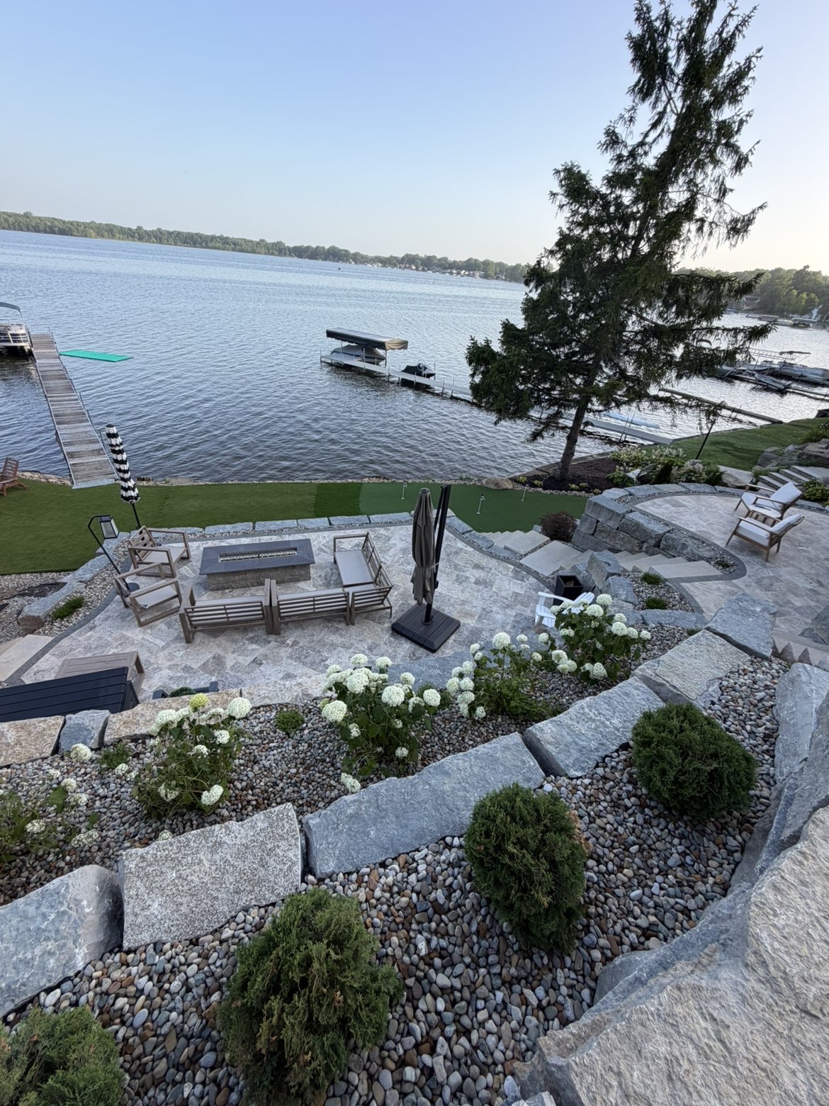Erosion control block retaining wall along shoreline edge