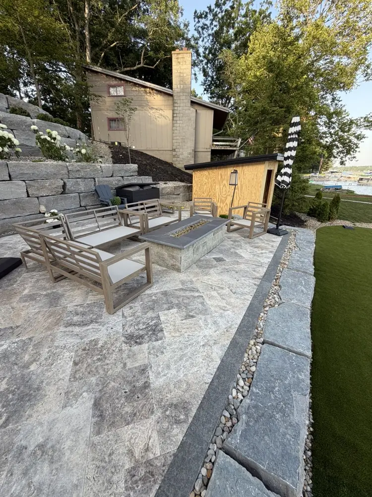Wide angle perspective of Duck Lake patio and shoreline wall