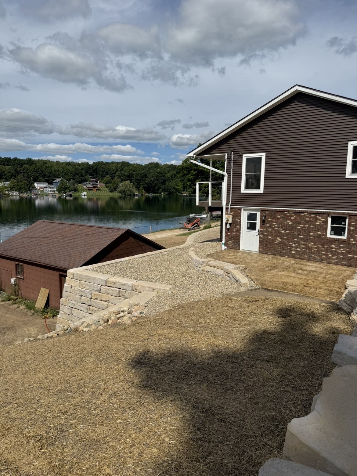 Multi-level outdoor patio section with surrounding retainment walls