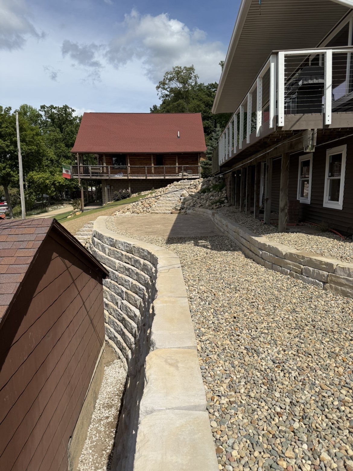 Perimeter structural retaining wall along estate foundation line