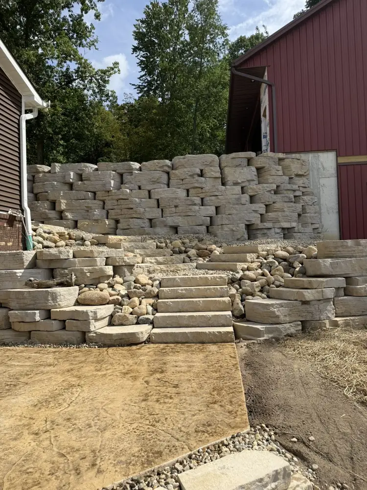 Side elevation view of multi-tiered retaining wall structural support