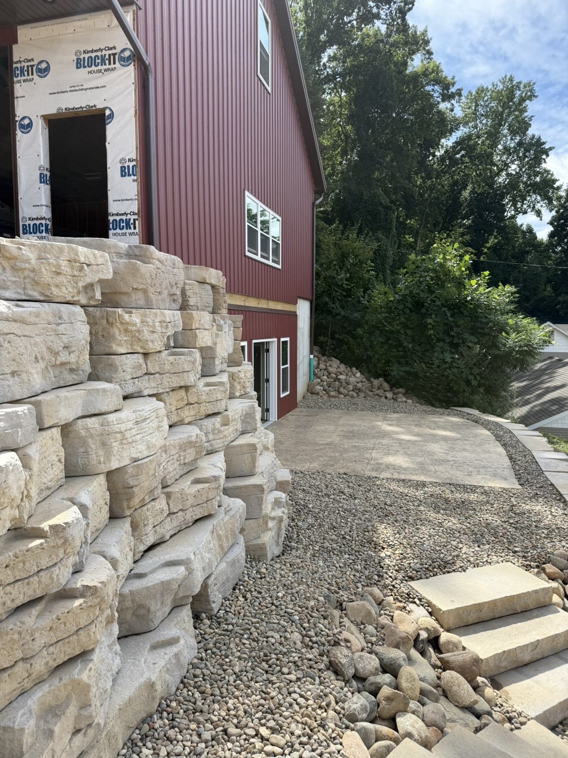 Wide angle perspective of full hillside excavation and hardscape layout