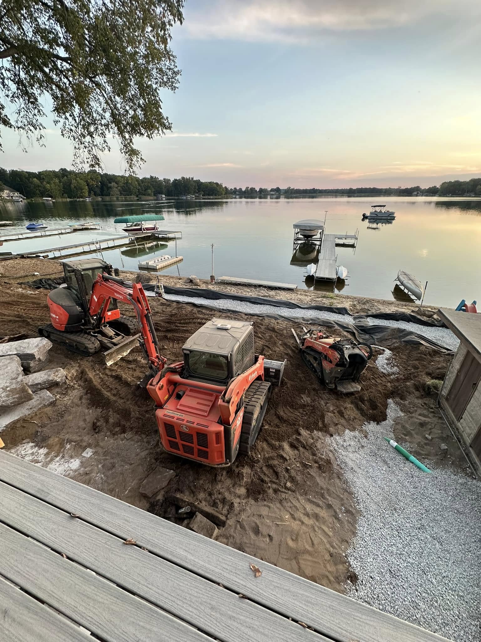 Precision land grading and site preparation using mini-excavator