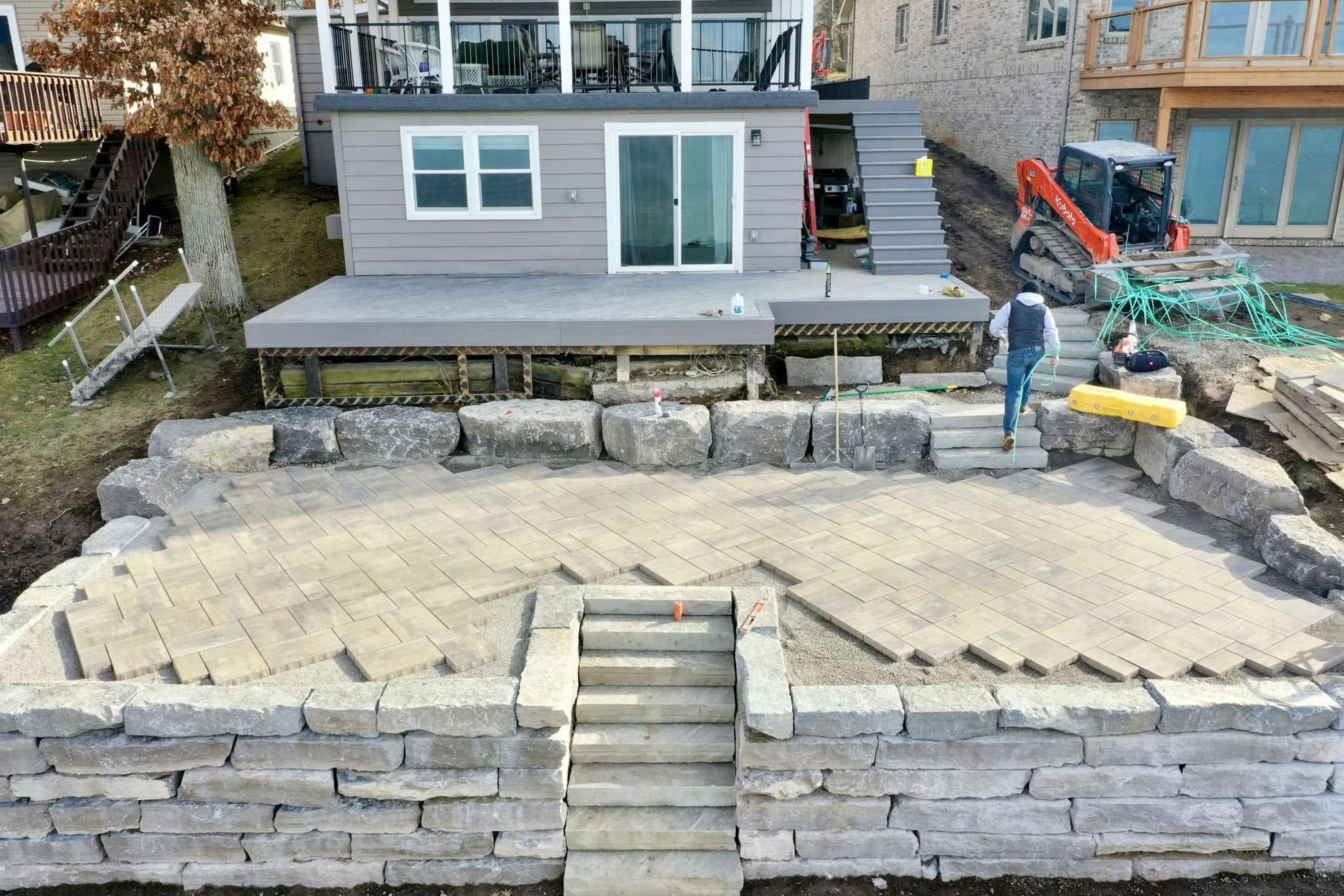 Elegant natural stone walkway and integrated front steps