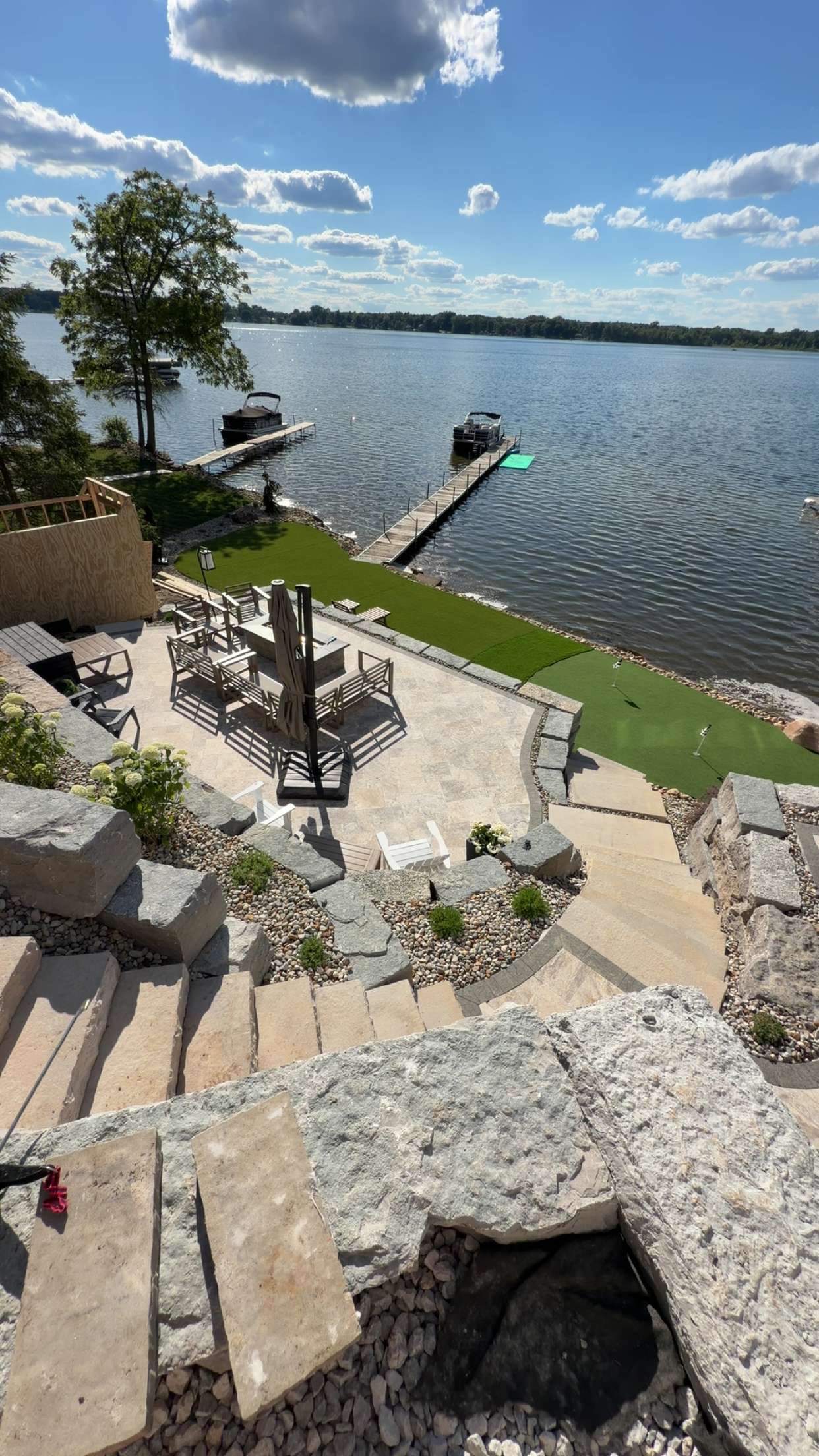 Finished outdoor entertainment area with custom hardscaping details