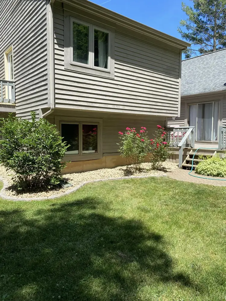 Custom paver walkway and integrated planting beds