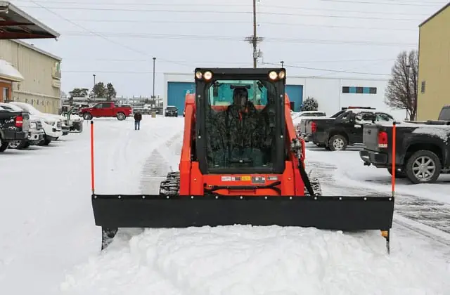 Commercial parking lot snow management in Marshall, MI by Valentine Outdoors