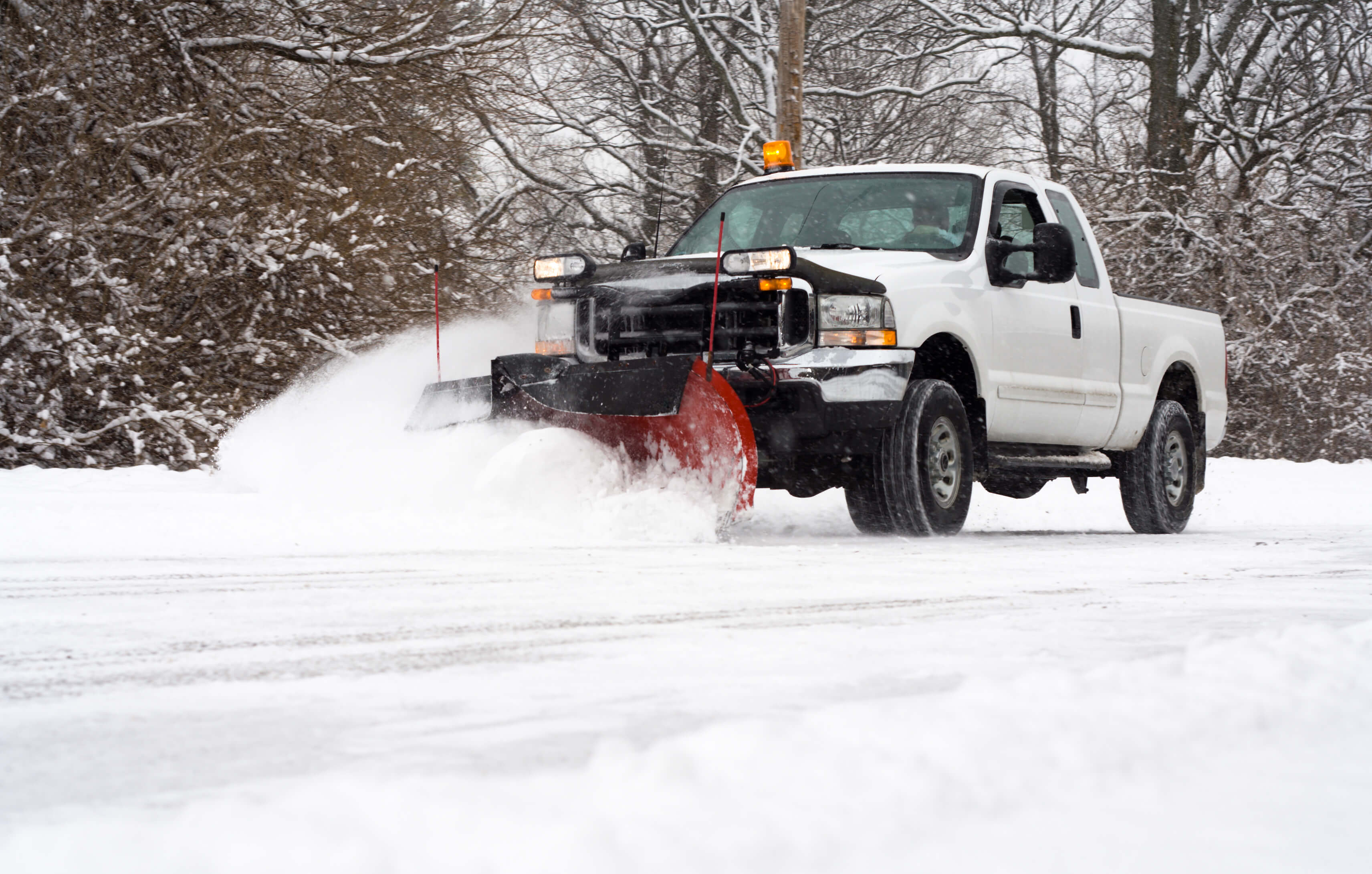 Sidewalk snow removal and de-icing service for winter safety
