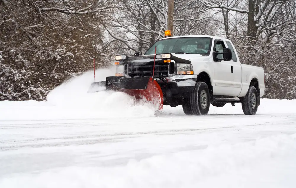 Sidewalk snow removal and de-icing service for winter safety